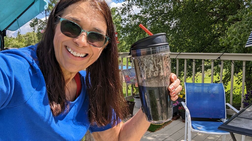 Rhonda Dodson drinking one of her many juices