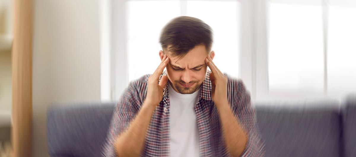 Man feeling dizzy from pseudo-exacerbation