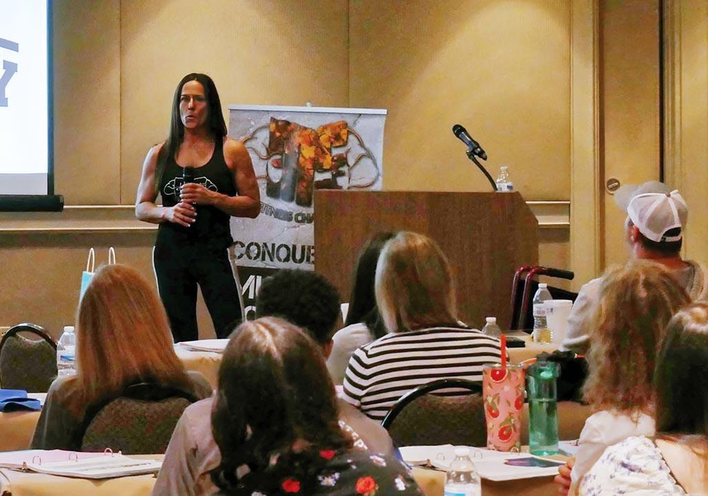 Angie Gensler speaking at an event